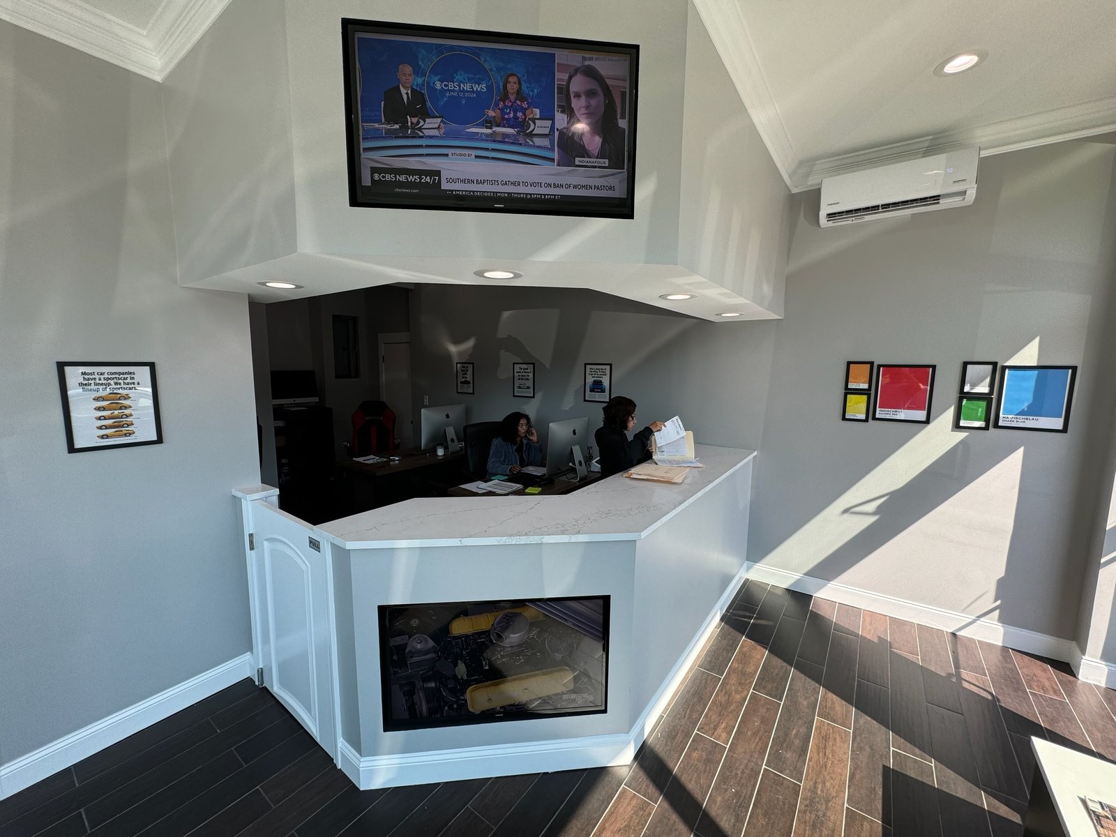The front office and reception desk at Luxxury Auto Body